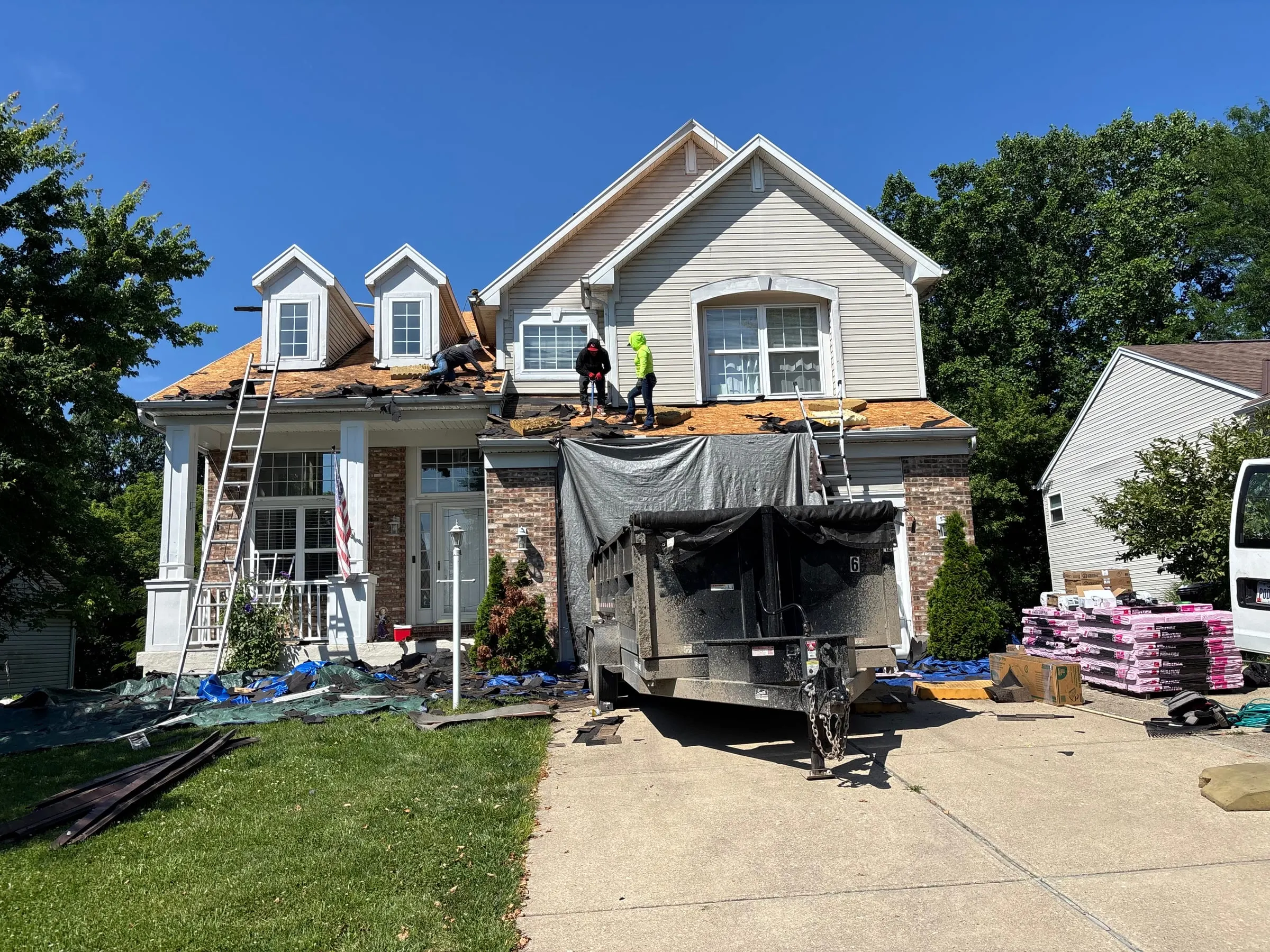Oaks crew at work on a roof replacement
